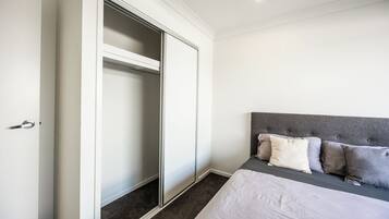 4 bedrooms, desk, iron/ironing board, travel cot