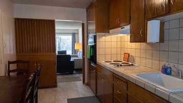 Apartment (Comfortable and Clean 2-Bedroom in Sa) | Private kitchen | Fridge, microwave, dishwasher, coffee/tea maker