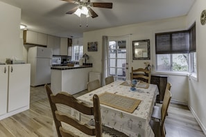 Fridge, microwave, coffee/tea maker, cookware/dishes/utensils