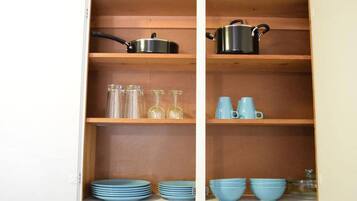 Fridge, microwave, coffee/tea maker, cookware/dishes/utensils