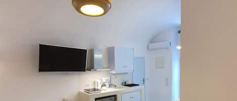 Nefeli Bioclimatic Cave Studio | Private kitchenette | Full-size fridge, oven, stovetop, coffee/tea maker