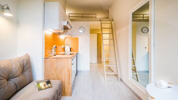 Economy Studio Suite | Living area | 42-inch Smart TV with digital channels, TV