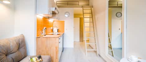 Economy Studio Suite | Living area | 42-inch Smart TV with digital channels, TV