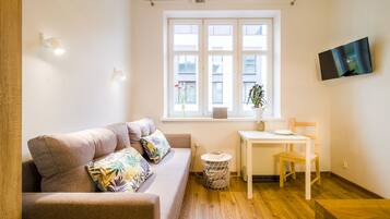 Economy Studio Suite | Living area | 42-inch Smart TV with digital channels, TV