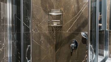 Comfort Room | Bathroom | Shower, hair dryer, towels, soap