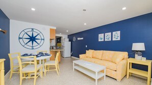 Room, 1 King Bed with Sofa bed, Kitchen, Garden View | Living room | TV