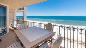 Outdoor dining - Phoenix X 714 - Beautiful 3BR Gulf Front Unit (Orange Beach)