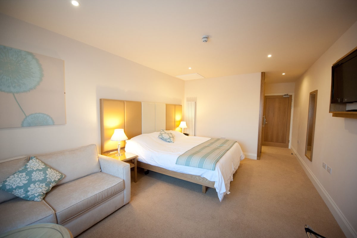 deluxe double room | desk, laptop workspace, blackout curtains, iron/ironing board