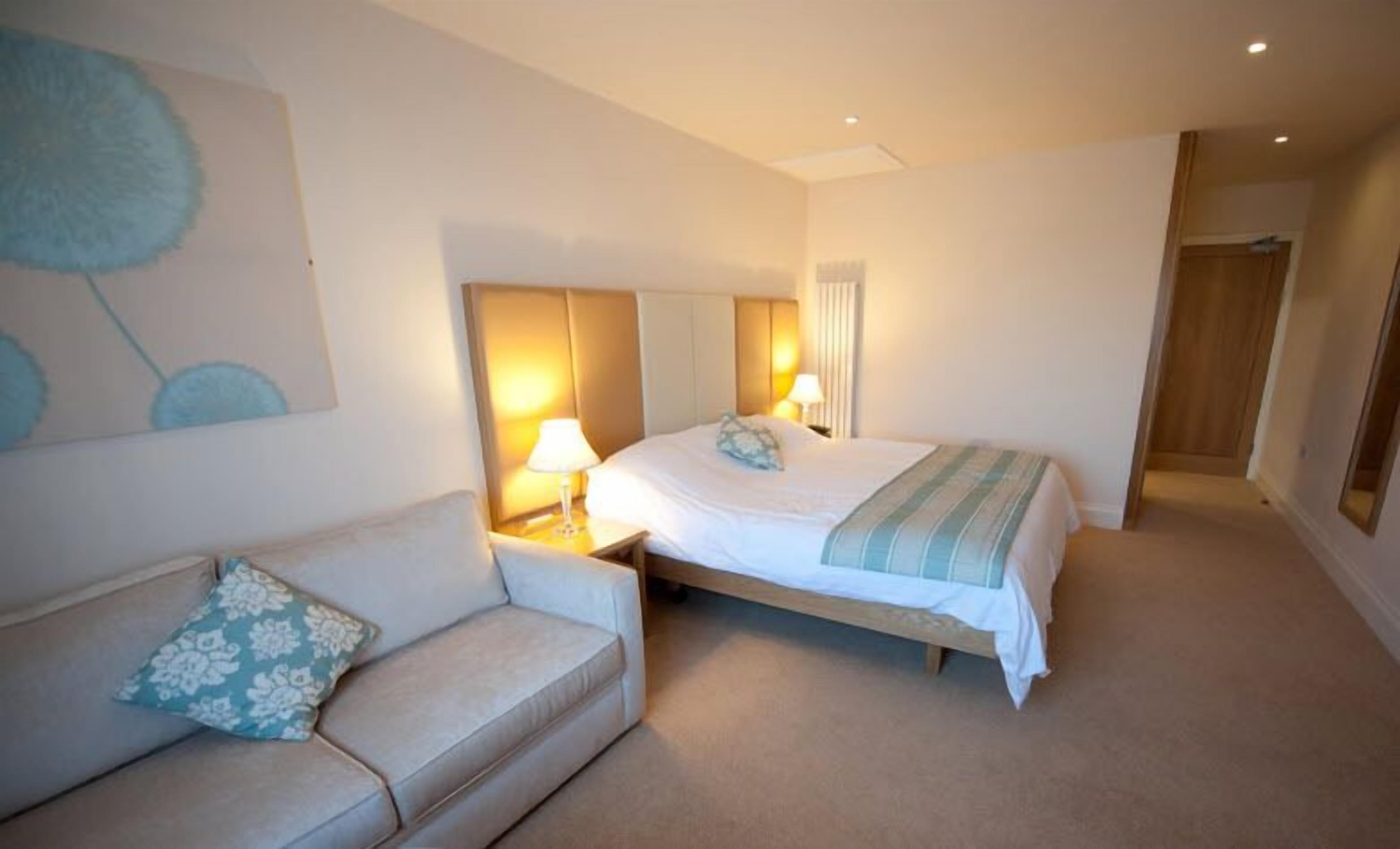 deluxe double room | desk, laptop workspace, blackout curtains, iron/ironing board