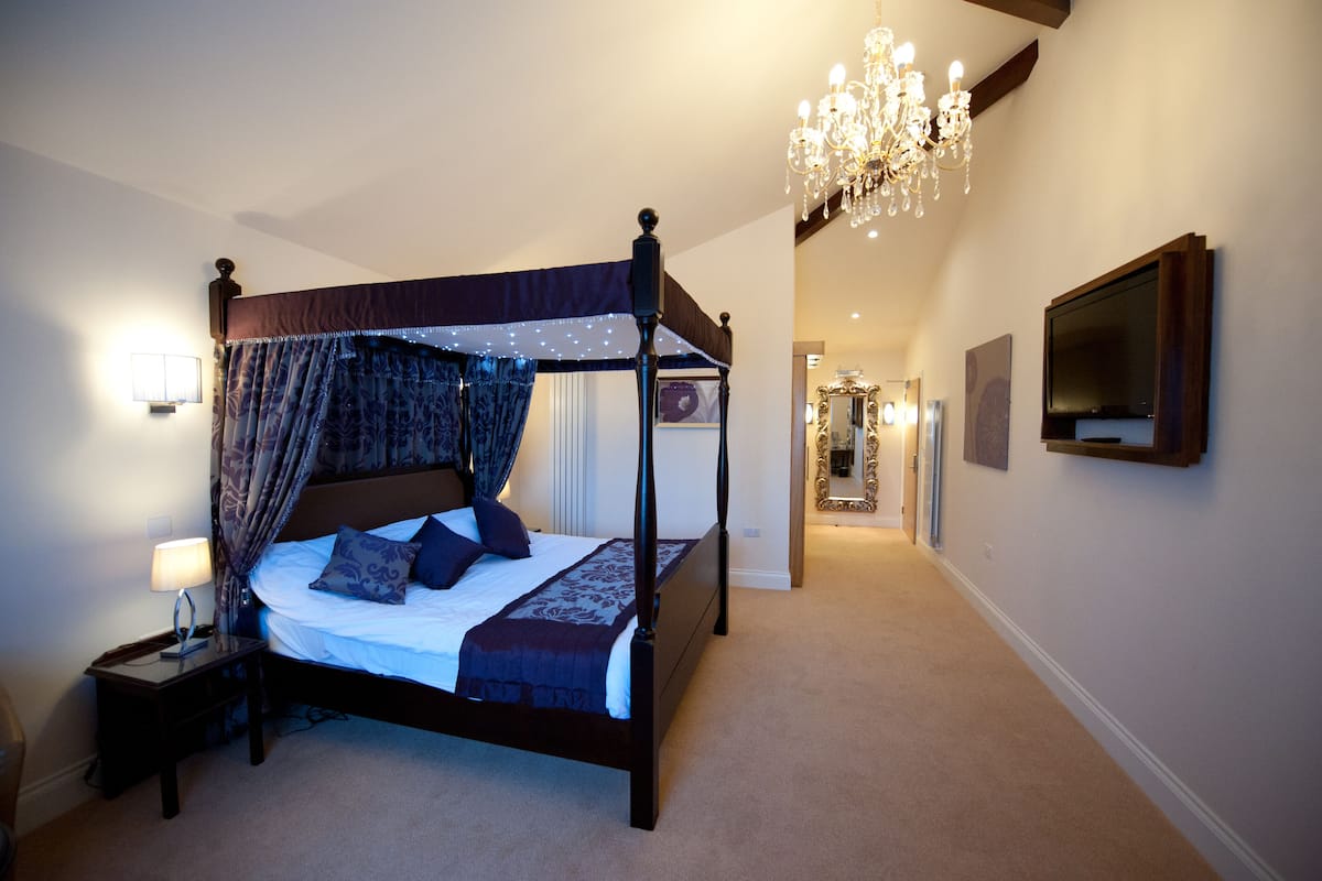 luxury double room | desk, laptop workspace, blackout curtains, iron/ironing board