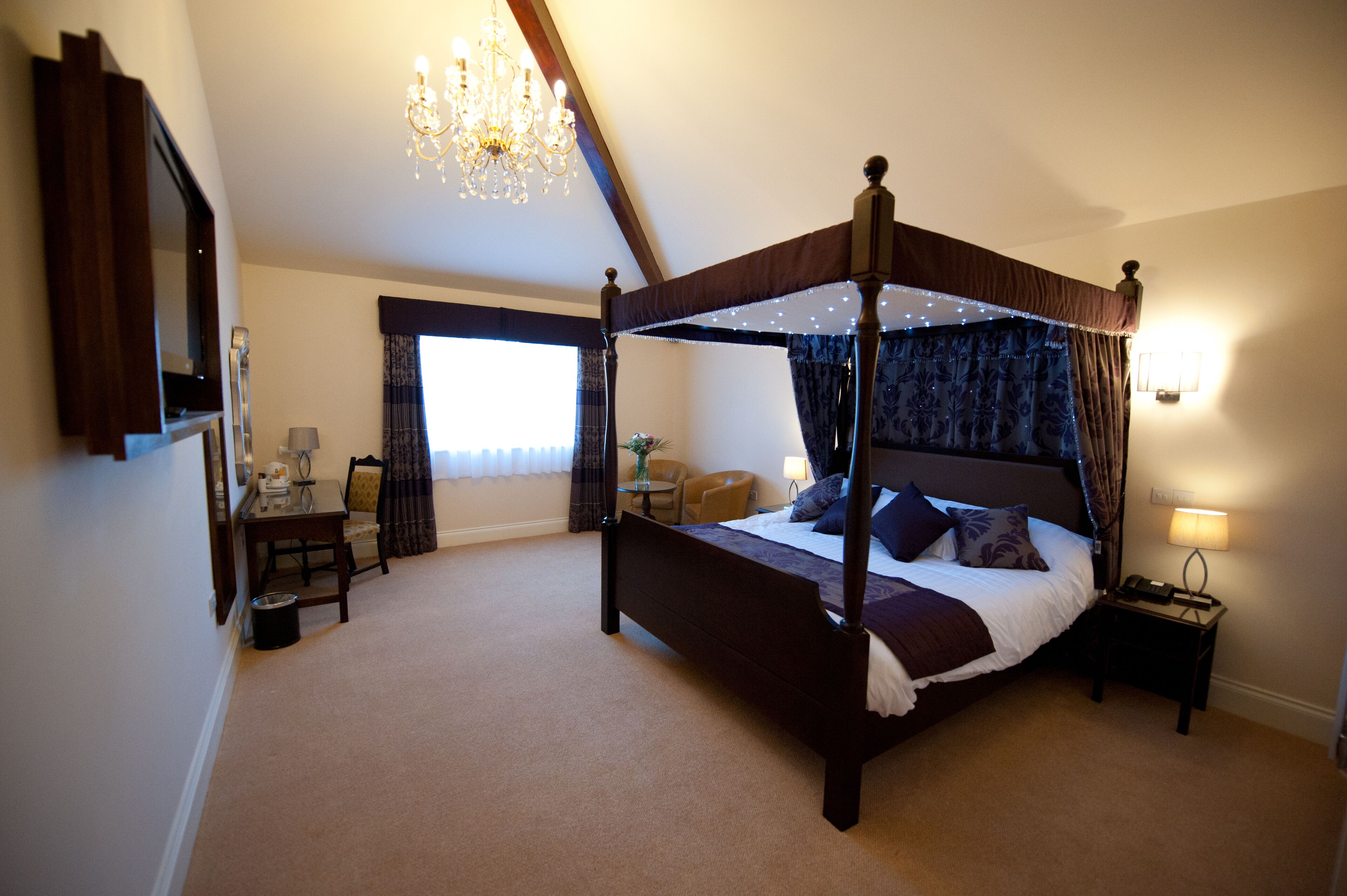 luxury double room | desk, laptop workspace, blackout curtains, iron/ironing board