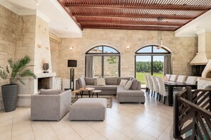 Villa, 4 Bedrooms, Private Pool | Living area | 32-inch LED TV with cable channels, TV, DVD player - Caldera Platanias Villas (Platanias)