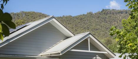 A house with a gabled roof and a porch.
