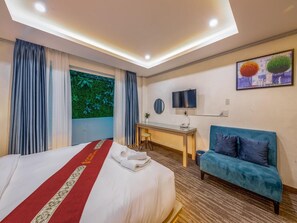 ห้องเอ็กซ์คลูซีฟ | พื้นที่ทำงานแบบใช้แล็ปท็อป, Wi-Fi ฟรี, ผ้าปูที่นอน