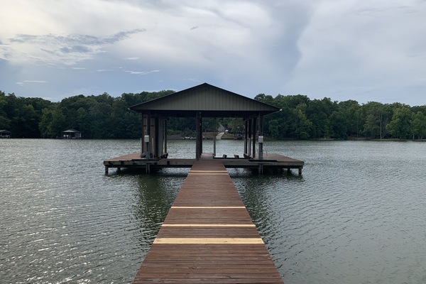 Large dock - One slip included w/ stay
2 Jet ski lifts