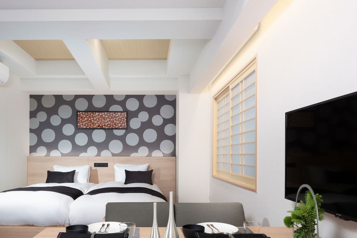 Family Apartment | 1 bedroom, hypo-allergenic bedding, down comforters, in-room safe