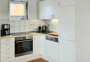 Fridge, oven, dishwasher, coffee/tea maker