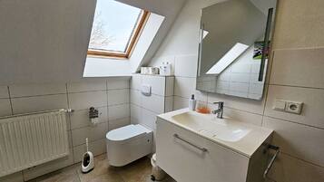 Apartment | Bathroom | Separate bathtub and shower, hair dryer, towels