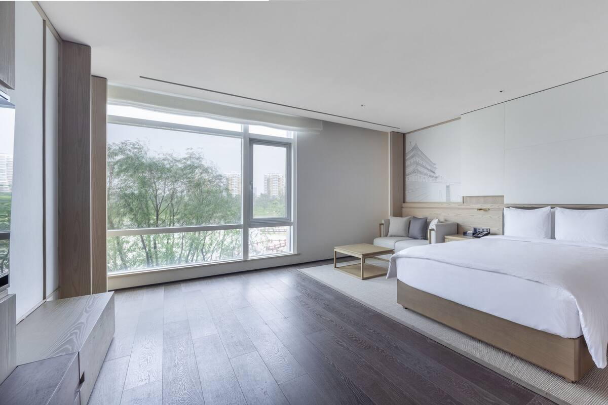 Premium Lake Suite | In-room safe, desk, blackout drapes, iron/ironing board