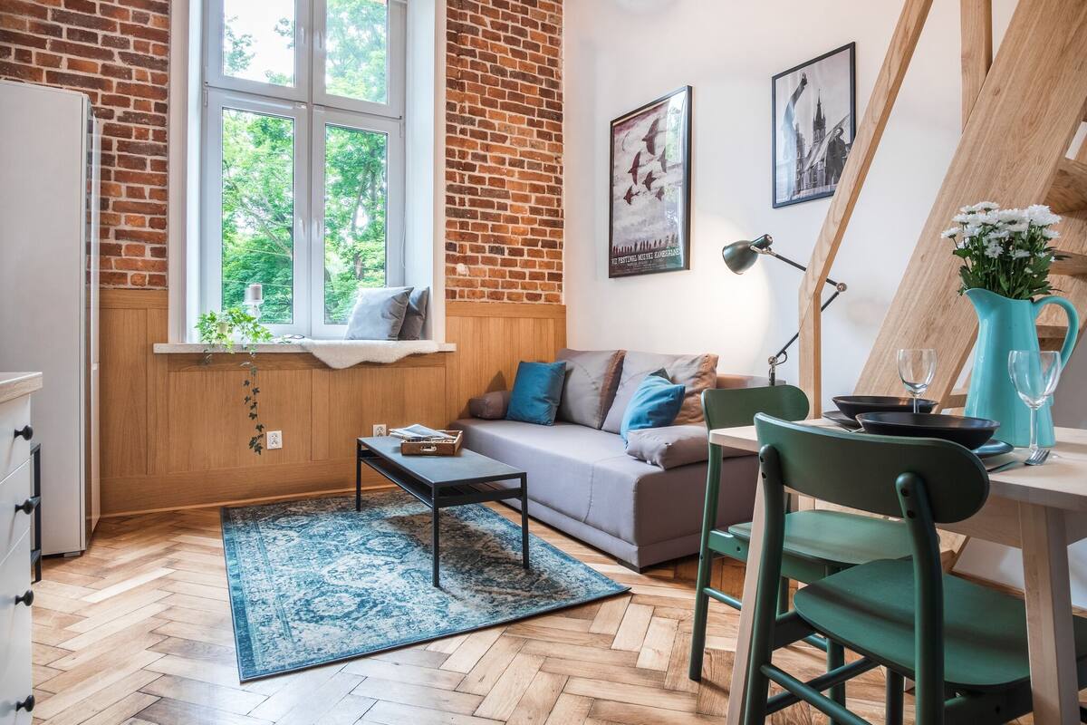 Suite studio Design | Aire de séjour | Téléviseur