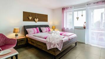 2 slaapkamers, een strijkplank/strijkijzer, gratis wifi, beddengoed