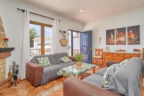 Télévision, cheminée, table de tennis de table