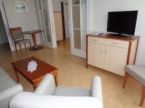 Apartamento, 1 cama de casal | Área de estar | Mesa de pingue-pongue