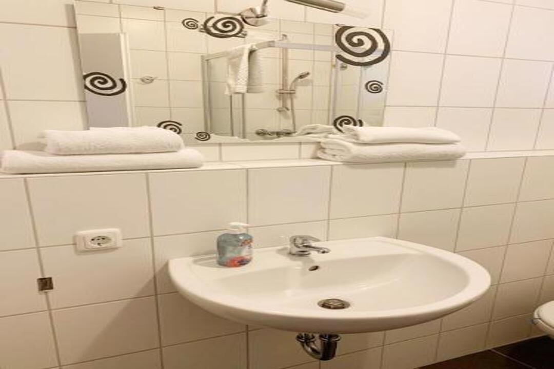 Shower, towels, soap, toilet paper