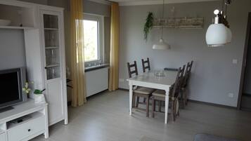 Apartemen | Area keluarga | TV layar datar