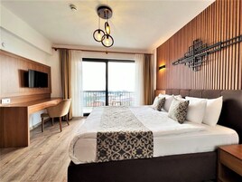 Luxury Double or Twin Room, Multiple Bedrooms, Sea View | Minibar, in-room safe, desk, laptop workspace