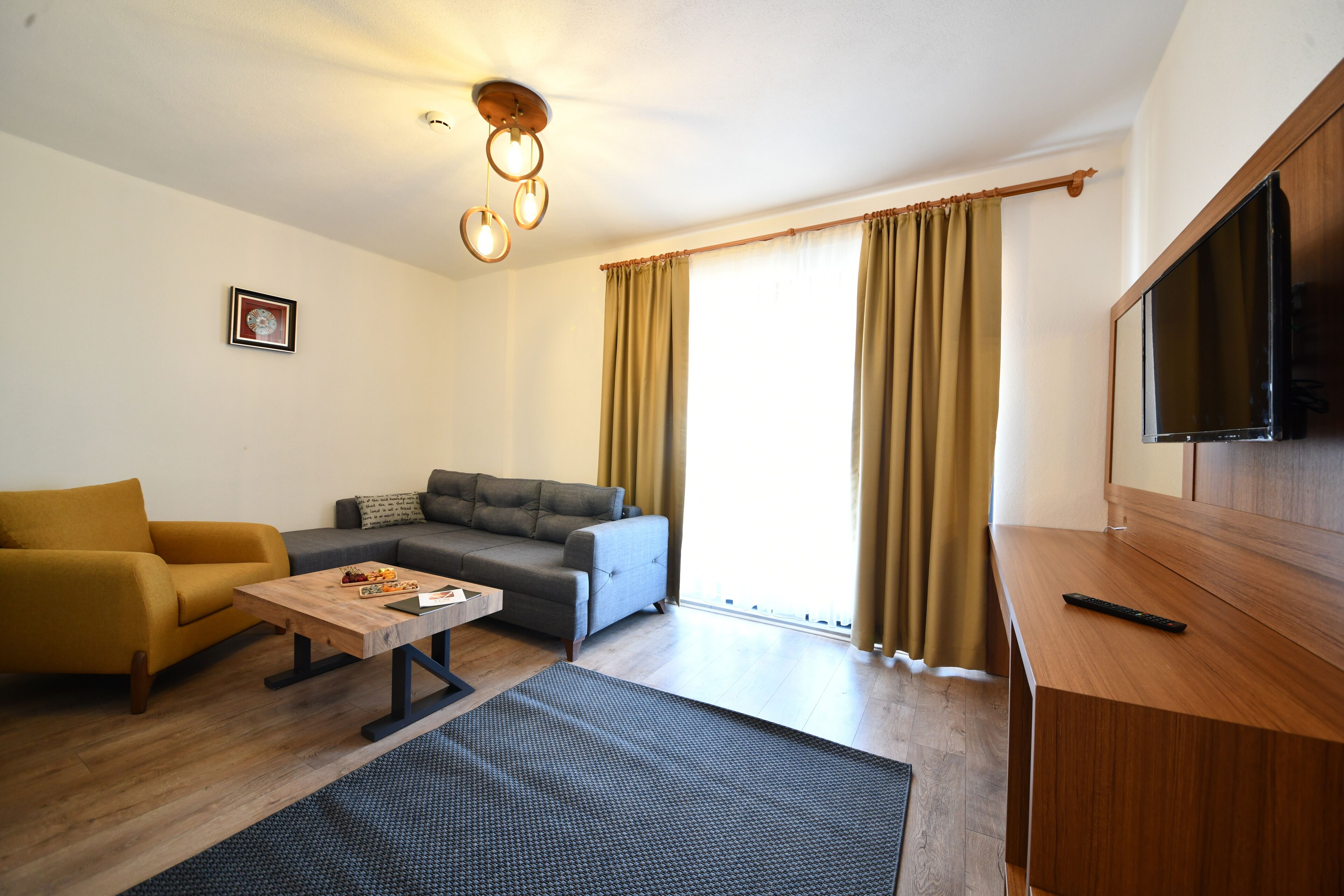 luxury double or twin room, multiple bedrooms, sea view | living area | 32-inch lcd tv with satellite channels, tv