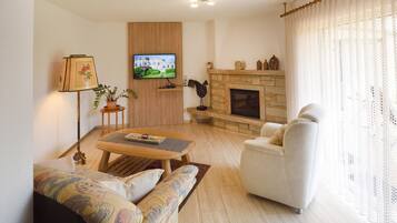 Condo, Terrace | Living area | 32-inch TV with satellite channels