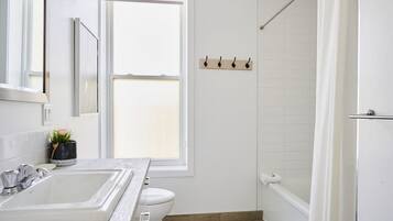 Hair dryer, towels, soap, shampoo