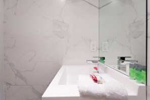 Hair dryer, towels, soap, shampoo