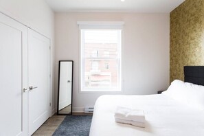 1 bedroom, desk, iron/ironing board, travel cot