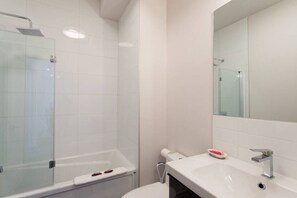 Hair dryer, towels, soap, shampoo