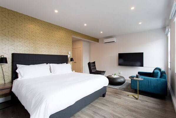 1 bedroom, desk, iron/ironing board, travel crib