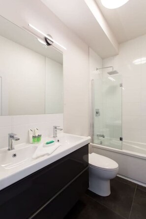 Hair dryer, towels, soap, shampoo