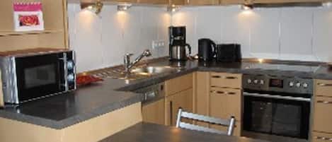 Apartment | Private kitchen | Fridge, microwave, oven, stovetop