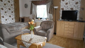 Apartment, 2 Bedrooms, Patio | Living area - Müllers Ferienwohnungen (Roedental)