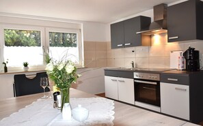 Kondominium, patio | Dapur pribadi | Lemari es, microwave, oven, dan kompor