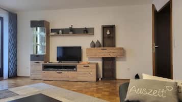 Apartment | Living area | 50-inch flat-screen TV with cable channels, TV
