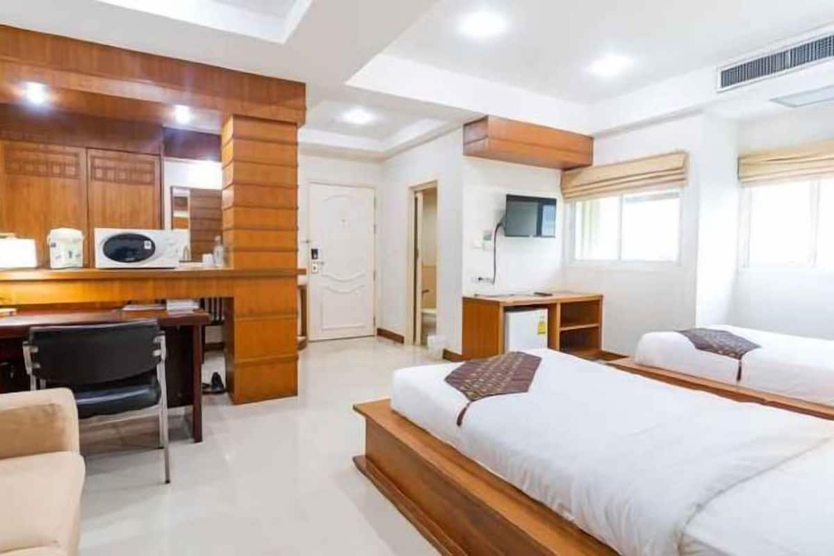 Desk, laptop workspace, free WiFi, bed sheets