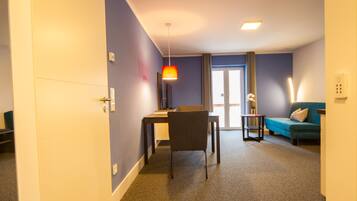 Apartment | Living area | 42-inch flat-screen TV with satellite channels, TV