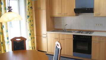 Apartment | Private kitchen | Fridge, stovetop, coffee/tea maker, electric kettle