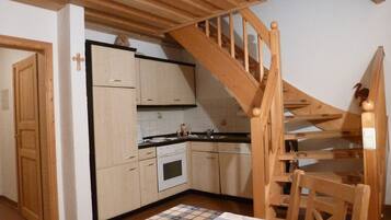 Apartment, Balcony, Garden View | Private kitchen | Coffee/tea maker, toaster, cookware/dishes/utensils