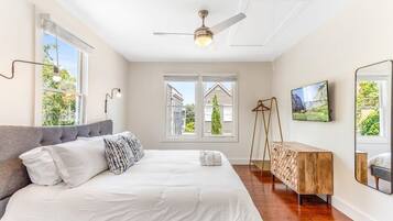 2 habitaciones, tabla de planchar con plancha, cuna de viaje y wifi