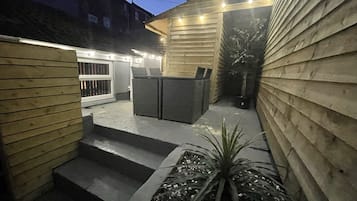Departamento Deluxe, baño privado, vista al jardín (Hottub ) | Jardín