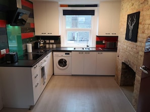 Appartement classique, salle de bain privée | Cuisine privée