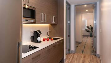 Fridge, microwave, stovetop, coffee/tea maker